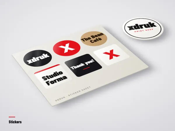 Round logo stickers on paper bags and jars