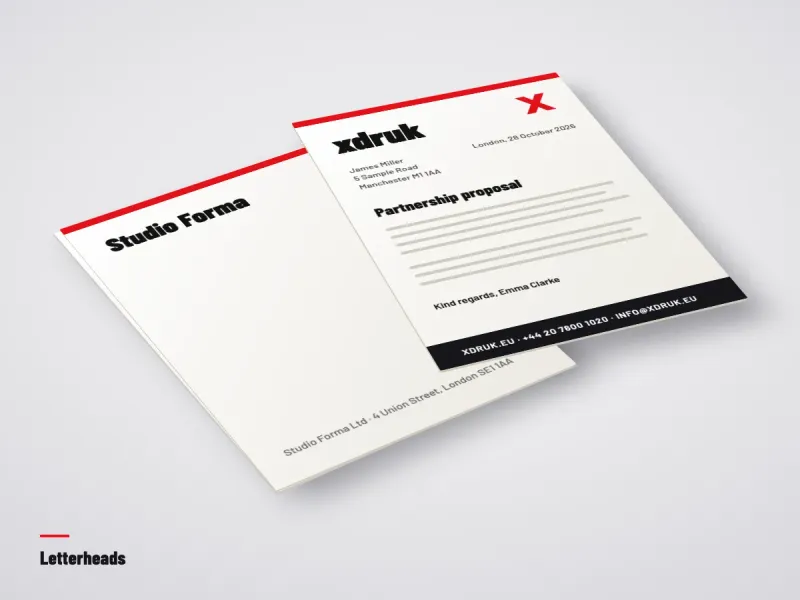 A4 letterhead with a company logo and address next to a pen