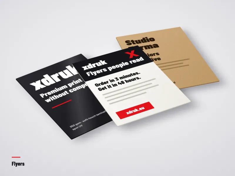 Stack of A5 full-colour flyers on a wooden table
