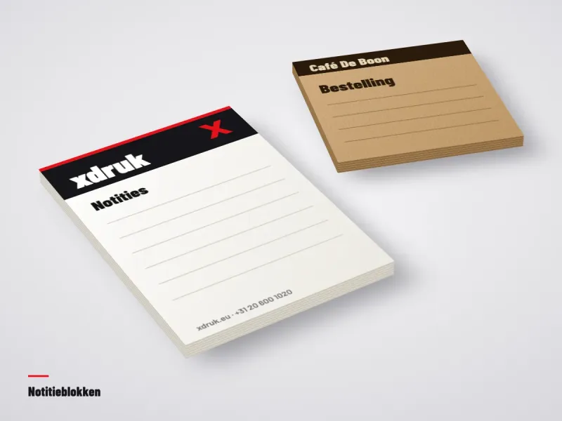 Notitieblok met vellen die aan de bovenrand zijn gelijmd